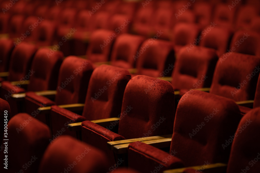 red velvet seats for spectators in the theater or cinema