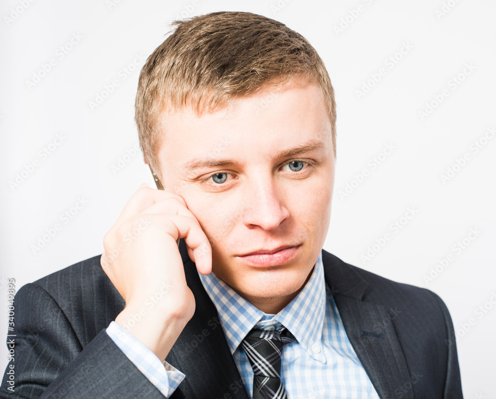 Portrait of cheerful man talking on the phone