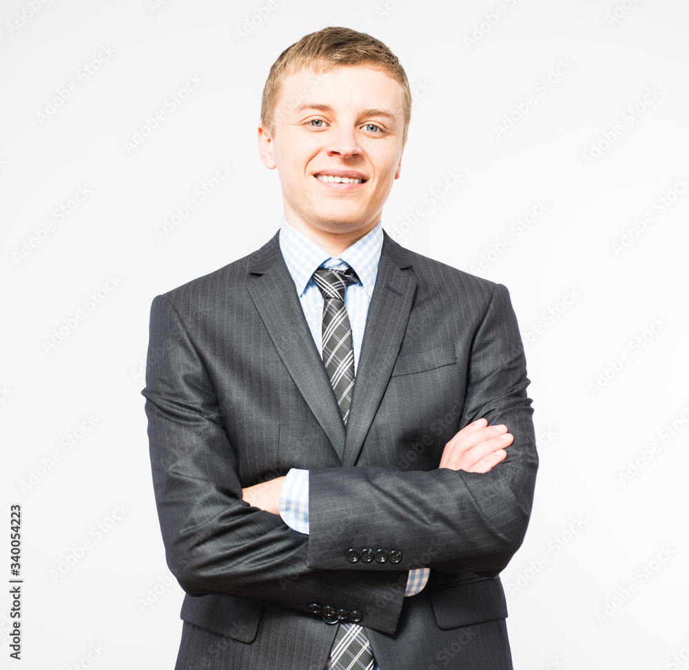 Friendly and smiling businessman looking at camera with reliability isolated Friendly and smiling businessman looking at camera with reliability isolated