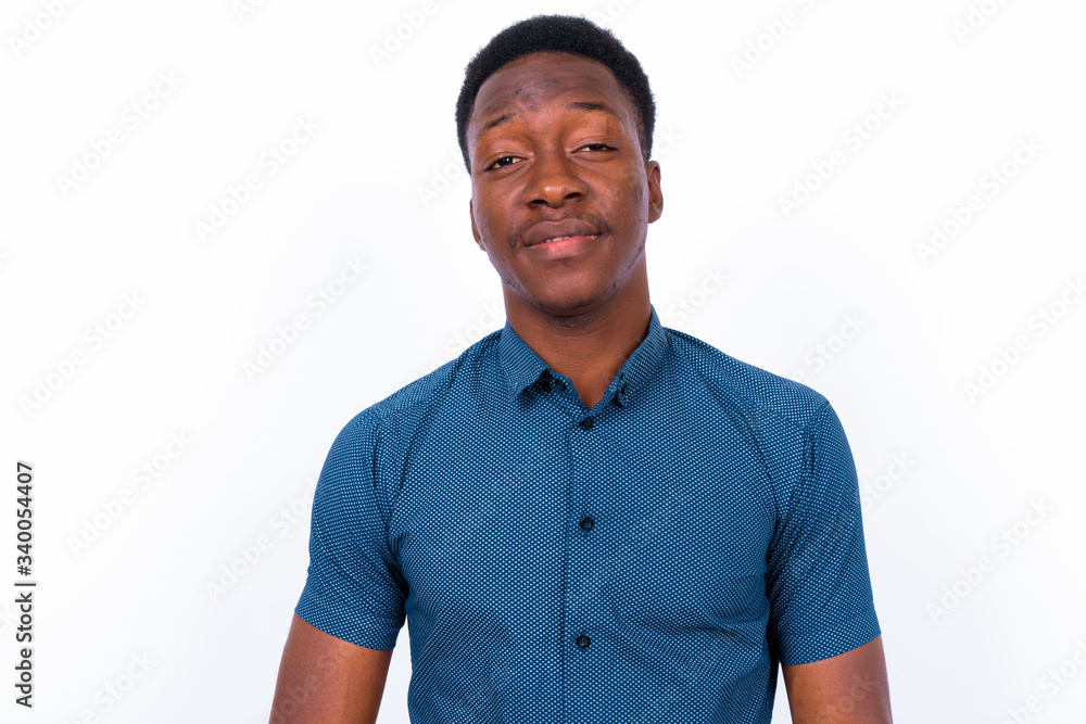 Young handsome African man against white background Young handsome African man against white background
