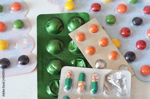 Different medicines: tablets, pills in blister pack, medications drugs, macro, selective focus, copy space