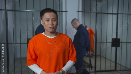 Young prisoner tells survival in prison. Medium shot