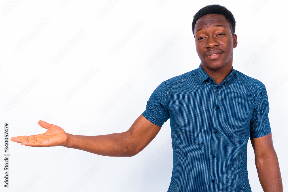 Young handsome African man against white background Young handsome African man against white background