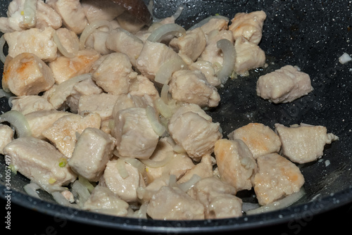 Close-up of homemade cooking chicken with creamy mushrooms