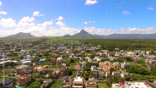 amazing landscape from a Drone Flight over the town of Flic en Flac in mauritius, travel and holiday desitination concept photo