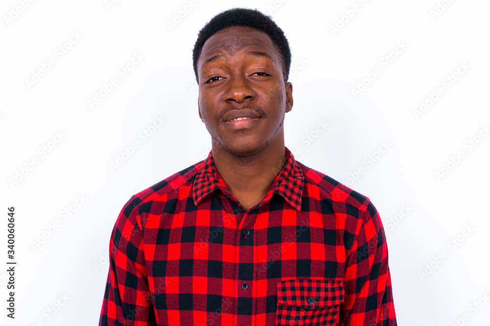 Young handsome African man against white background Young handsome African man against white background