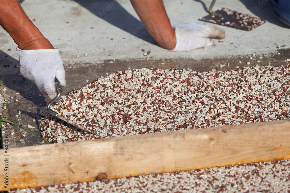 Laying the floor around the outdoor pool.