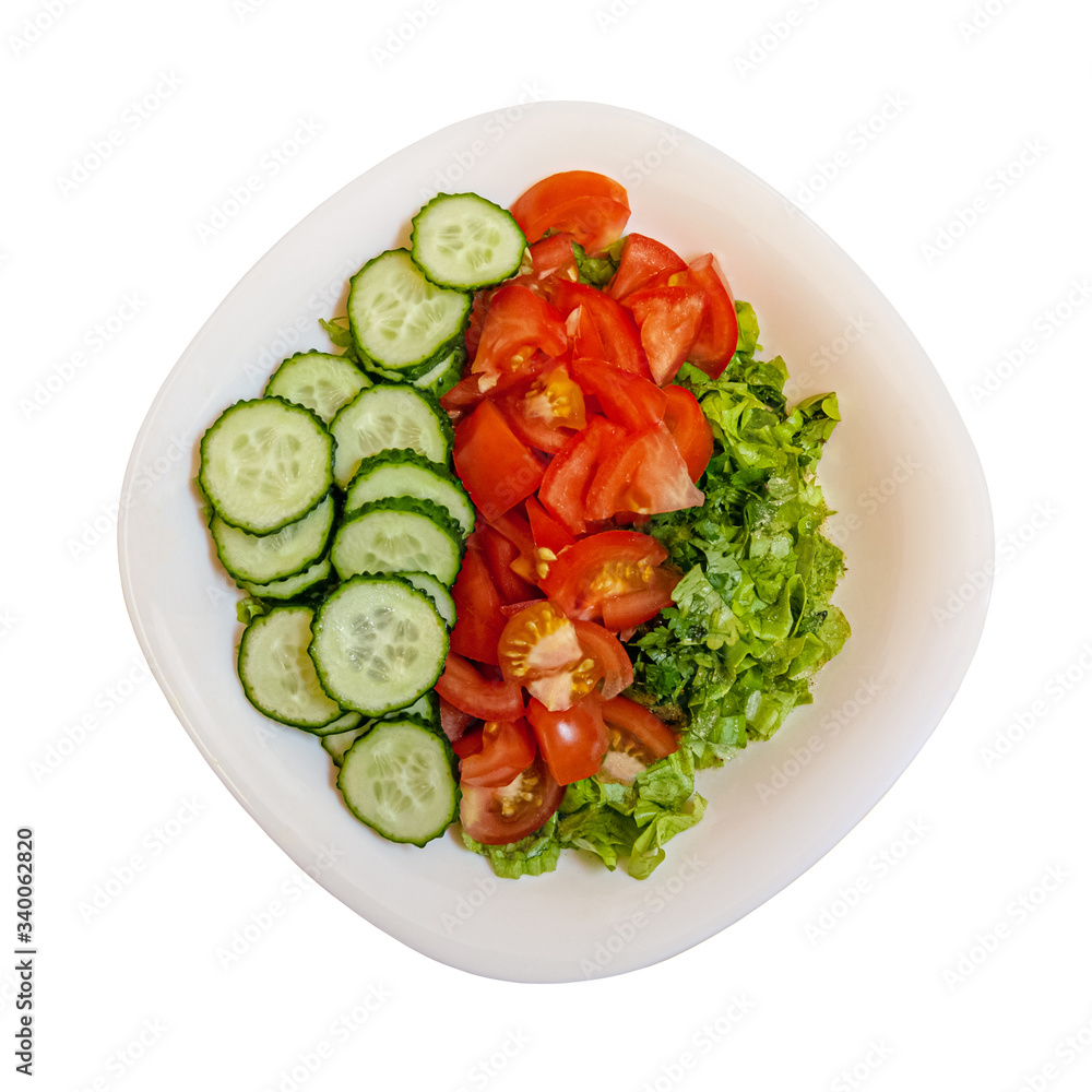 vitamin salad of tomatoes, cucumbers, spinach and spicy greens in white porcelain bowl isolated on white vitamin salad of tomatoes, cucumbers, spinach and spicy greens in white porcelain bowl isolated on white