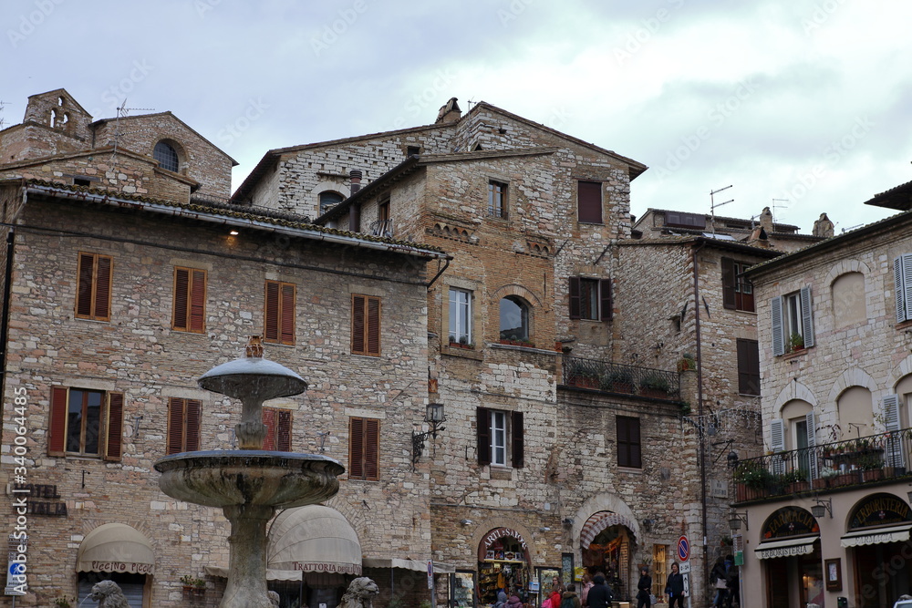 Assisi, Italy - 11/30/2019: The streets of the medieval village of Assisi
