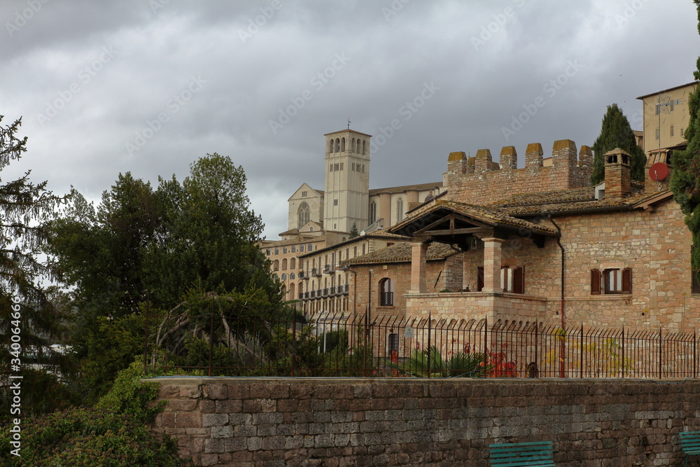 Assisi, Italy - 11/30/2019: The streets of the medieval village of Assisi Assisi, Italy - 11/30/2019: The streets of the medieval village of Assisi