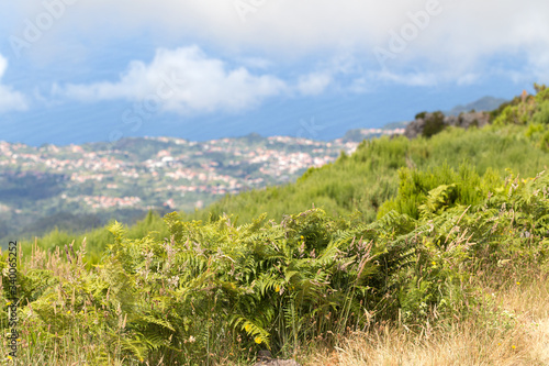 View of the ocean coast and village from the tops of the mountains on the island of Madeira, Portuga