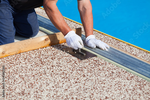 Laying the floor around the outdoor pool.