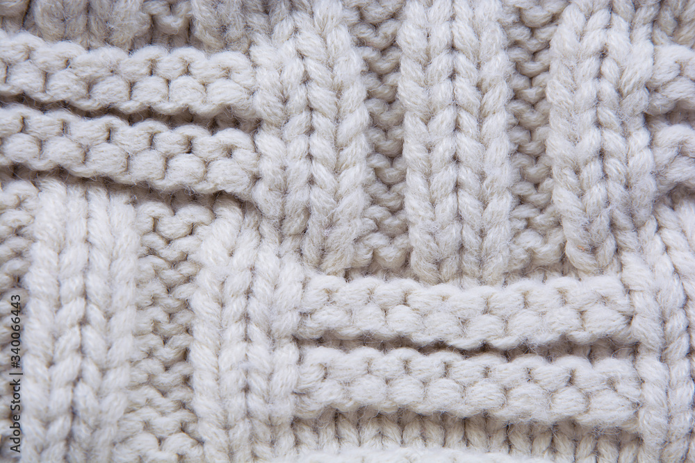 knitted pattern light beige closeup with soft blur knitted pattern light beige closeup with soft blur