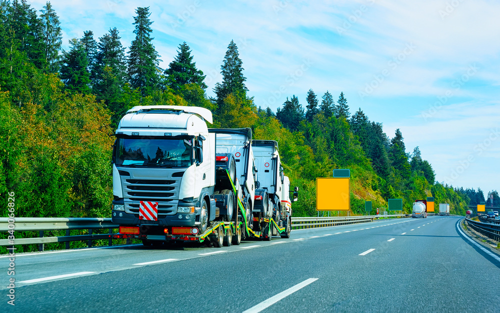 Truck cabin carrier on asphalt road in Slovenia reflex Truck cabin carrier on asphalt road in Slovenia reflex