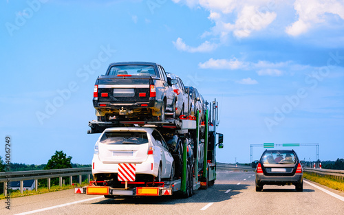 Cars carrier at road in Poland reflex © Roman Babakin