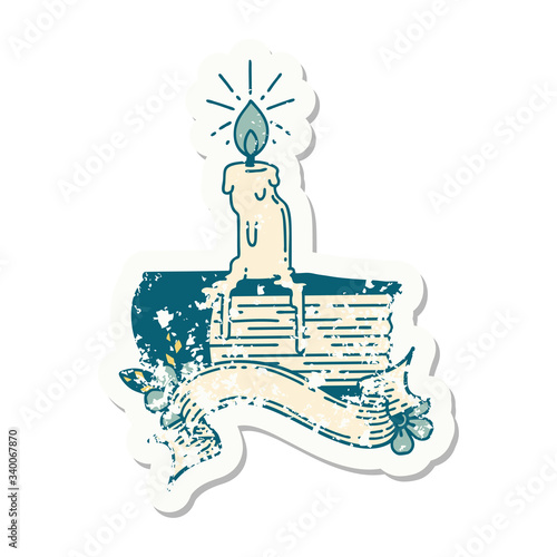 grunge sticker of tattoo style candle melting on book