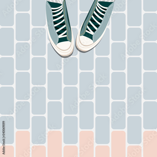 Feet on the tiles. Trainers on tile floor top down. Feet in sport's shoes standing on the ground. Trendy social media style flat lay illustration. Colorful sneakers and flourishing flooring.