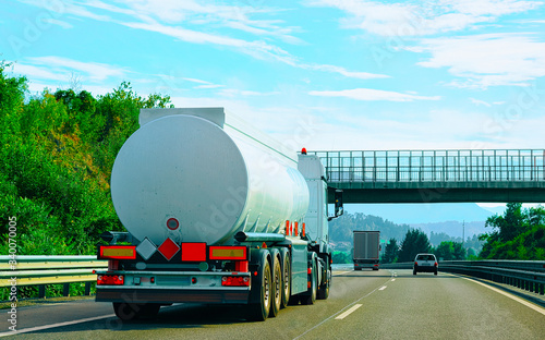 White Tanker truck in asphalt highway in Poland reflex