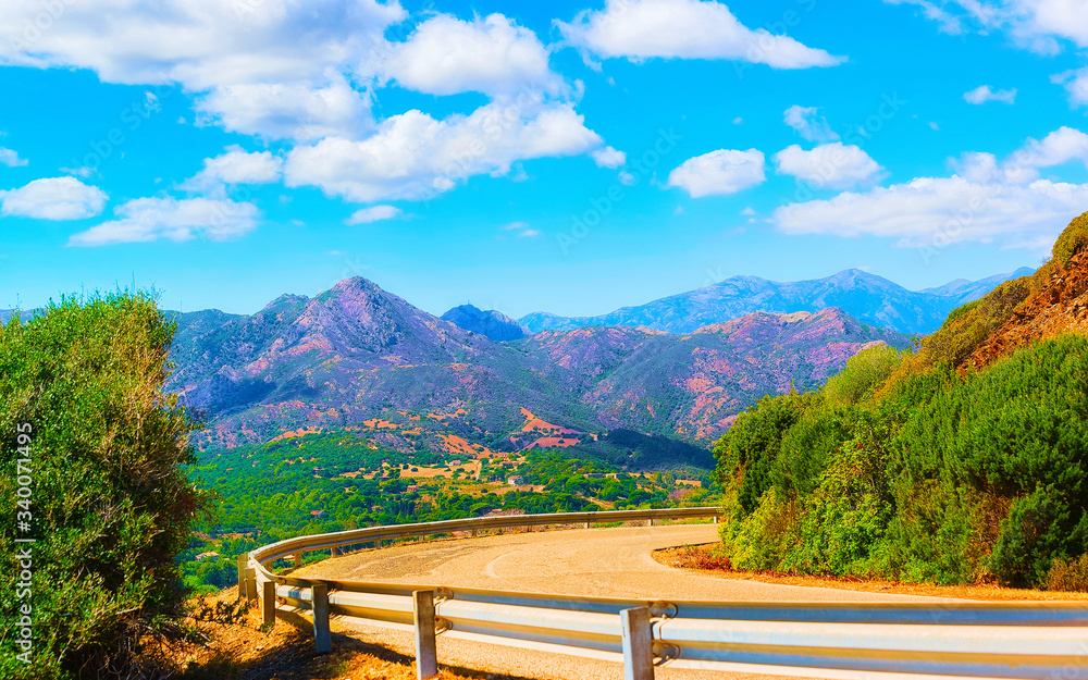 Fototapeta premium Road and Mountains at Buggerru Sardinia reflex
