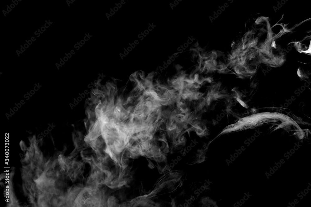 White isolated smoke on black background White isolated smoke on black background