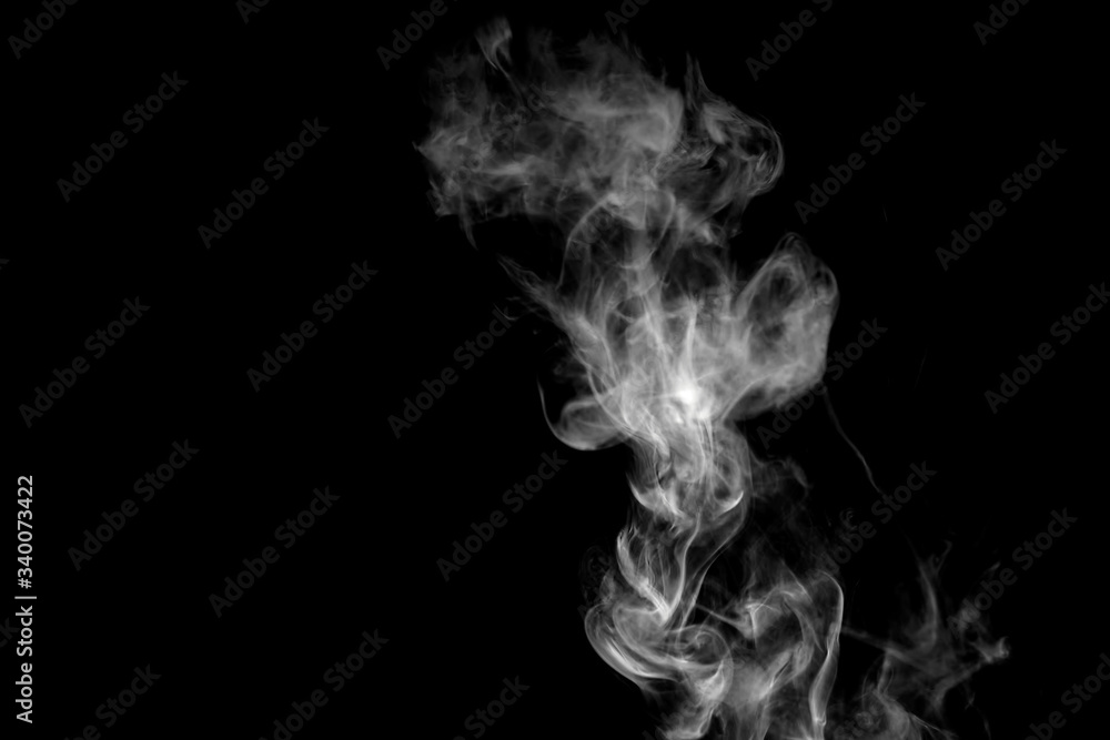 White isolated smoke on black background White isolated smoke on black background