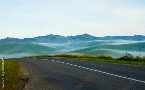 Empty Road with landscape and fog reflex