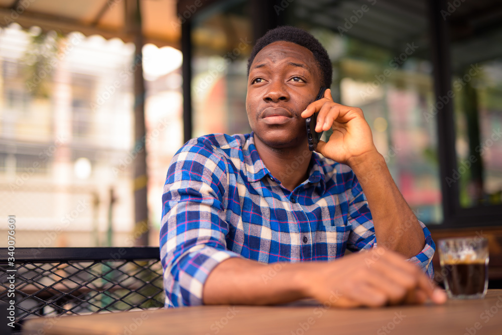 Young handsome African man exploring the city Young handsome African man exploring the city
