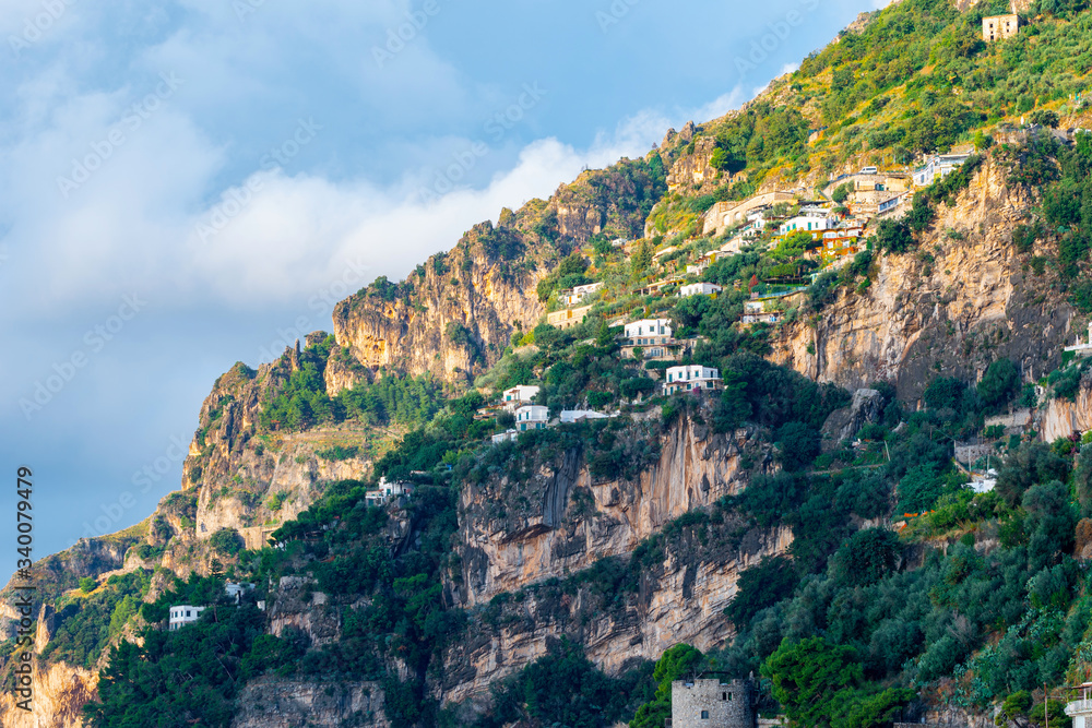 Typical narrow street and colorful houses in city of Positano, Amalfi coast