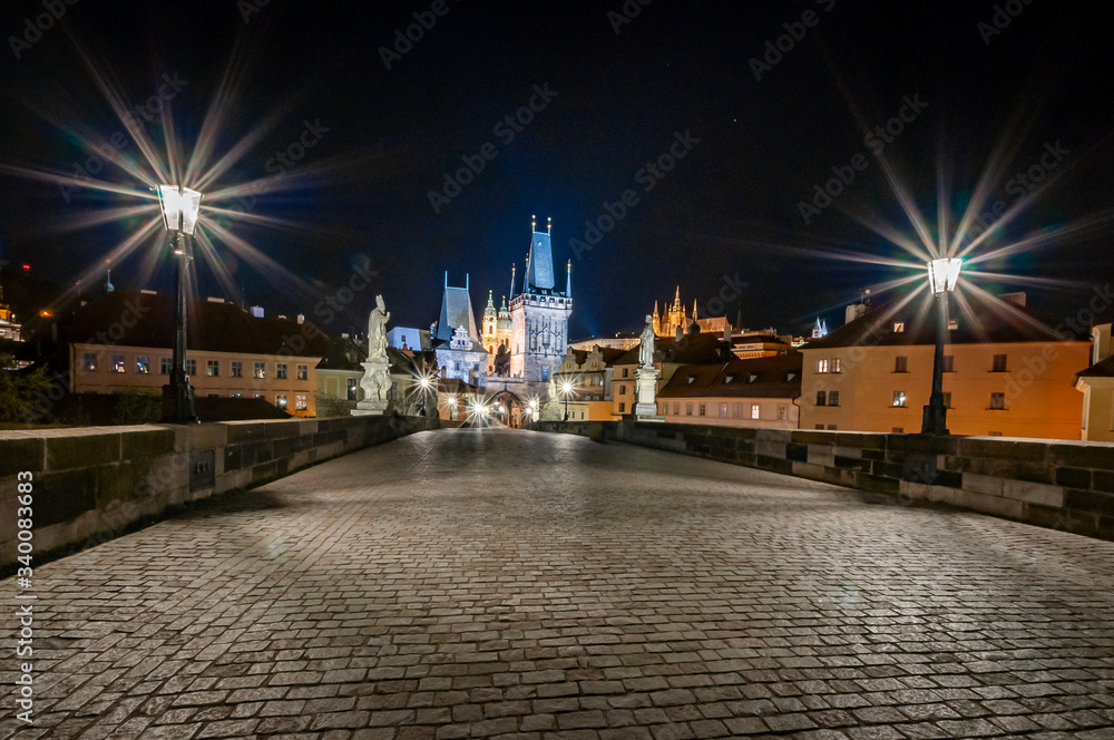 Empty Charles Bridge in Prague at night. Empty Prague during pandemic covid-19. No people.