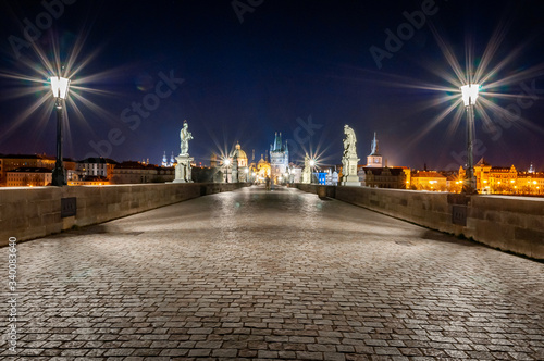 Empty Charles Bridge in Prague at night. Empty Prague during pandemic covid-19. No people.