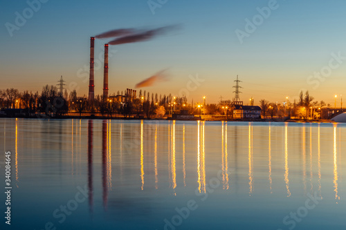 Evening industrial landscape reflecting in the river, Voronezh, Russia