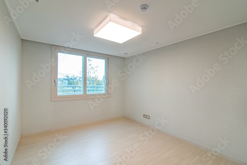 Interior of an empty small bedroom in a new apartment. New apartment interior in South Korea.