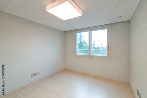 Interior of an empty small bedroom in a new apartment. New apartment interior in South Korea.