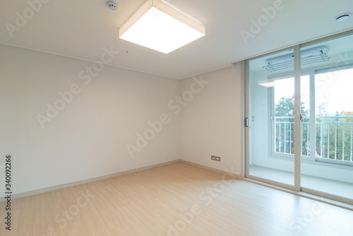Interior of an empty master bedroom in a new apartment. 
New apartment interior in South Korea.