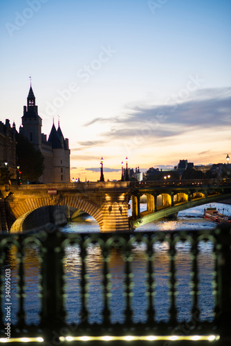 Paris at night with amazing sky and bridge river and castle