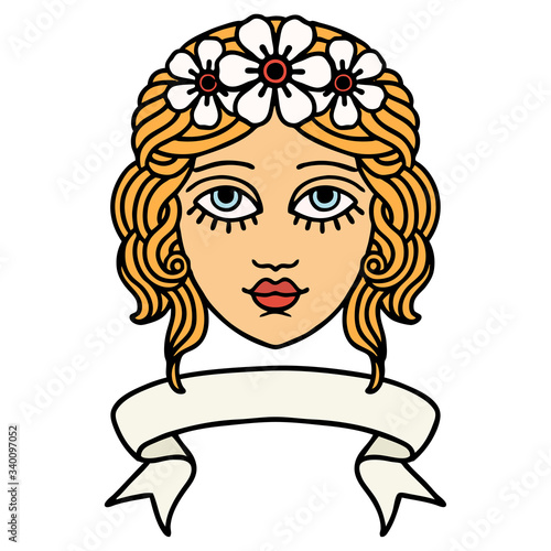 tattoo with banner of female face with crown of flowers