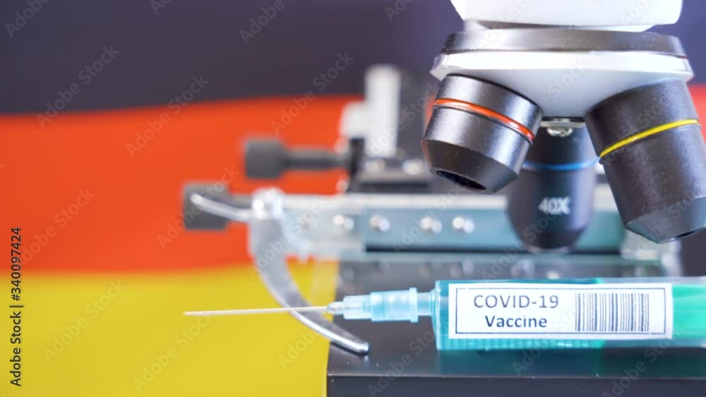 The Belgium flag and the coronavirus or Covid-19 vaccine in the syringe The Belgium flag and the coronavirus or Covid-19 vaccine in the syringe