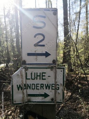 Hiking trail Luhe Wanderweg in Luneburger heath directional sign in nature photo