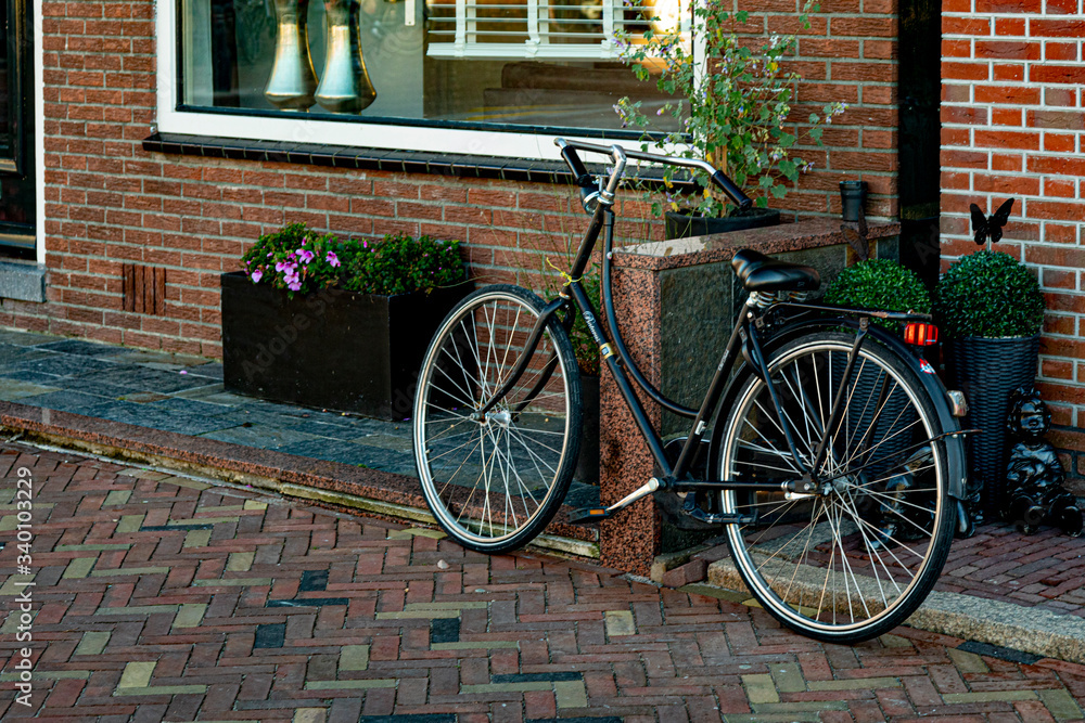 bicycle in front of a house