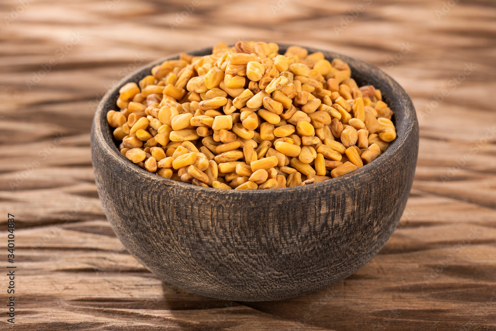 Raw fenugreek seeds in bowl - Methi Dana Raw fenugreek seeds in bowl - Methi Dana