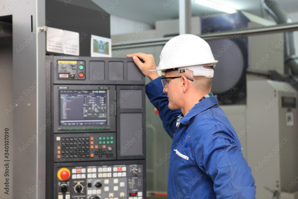 Male Industrial Engineers with machine. Assist production engineer in industry. He checking and control flow of process in production. Concept Successful of Work. Male Industrial Engineers with machine. Assist production engineer in industry. He checking and control flow of process in production. Concept Successful of Work.