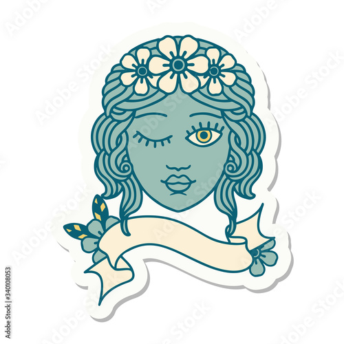 tattoo sticker with banner of a maidens face winking