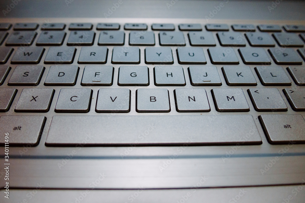 laptop computer keyboard with the surface of the mouse