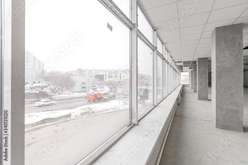 empty pure commercial office building undecorated in gray colors.open space office