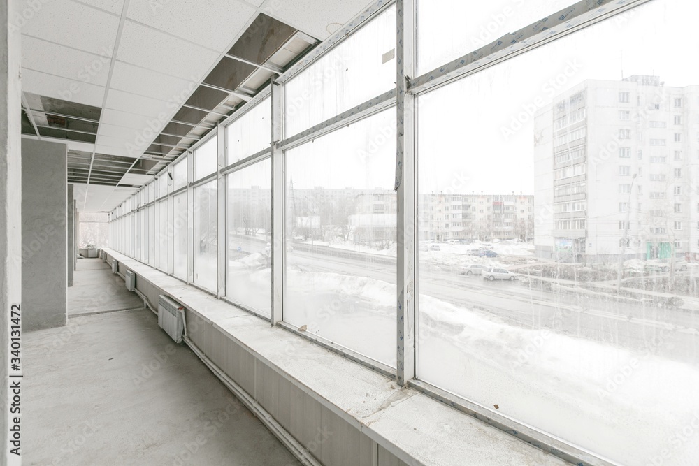 Obraz premium empty pure commercial office building undecorated in gray colors.open space office