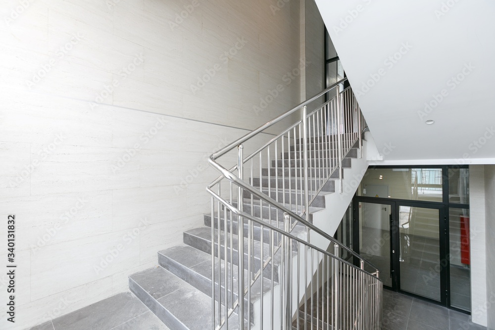 empty pure commercial office building undecorated in gray colors.open space office empty pure commercial office building undecorated in gray colors.open space office