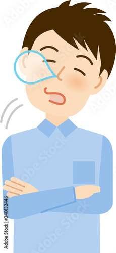 居眠りをする若い男性