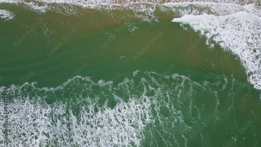 Drone shoot fly over Bordeaux beach, clearly wave with the green shore ocean colour is also influenced by runoff, tide-induced resuspension of fine particles from the bottom Drone shoot fly over Bordeaux beach, clearly wave with the green shore ocean colour is also influenced by runoff, tide-induced resuspension of fine particles from the bottom