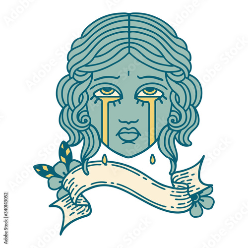 tattoo with banner of female face crying