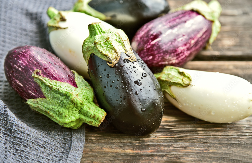 3 colorful mixed of Eggplant (Solanum melongena) or aubergine with water drop.
